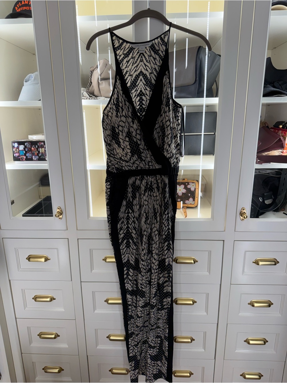 Diane Von Furstenberg 100% silk Black and Cream Patterned Wrap jumpsuit suit